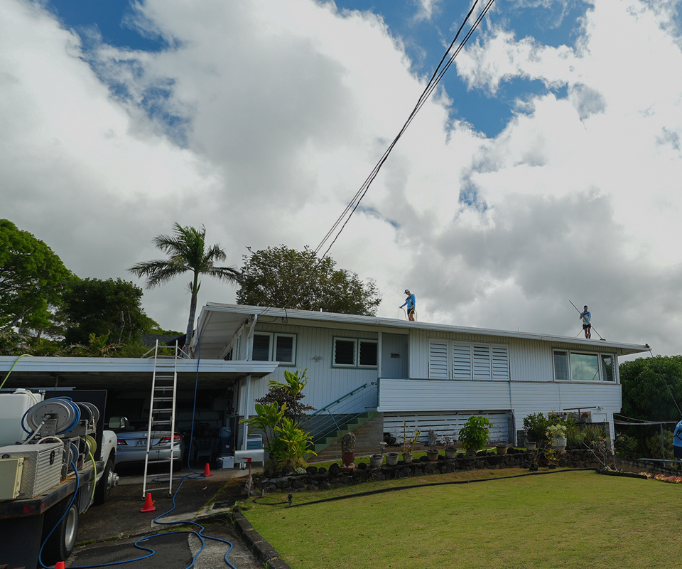 image of Soft washing a roof